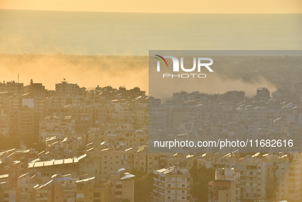 Black smoke billows from Beirut's southern suburb following heavy Israeli air raids on the pro-Iranian Hezbollah stronghold in Beirut, Leban...