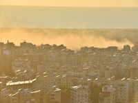 Black smoke billows from Beirut's southern suburb following heavy Israeli air raids on the pro-Iranian Hezbollah stronghold in Beirut, Leban...