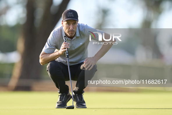 Ross Fisher of England studies his shot on the 1st green on the third day of the Estrella Damm N.A. Andalucia Masters 2024 at Real Club de G...