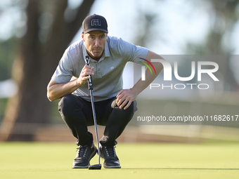 Ross Fisher of England studies his shot on the 1st green on the third day of the Estrella Damm N.A. Andalucia Masters 2024 at Real Club de G...