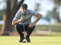 Ross Fisher of England studies his shot on the 1st green on the third day of the Estrella Damm N.A. Andalucia Masters 2024 at Real Club de G...