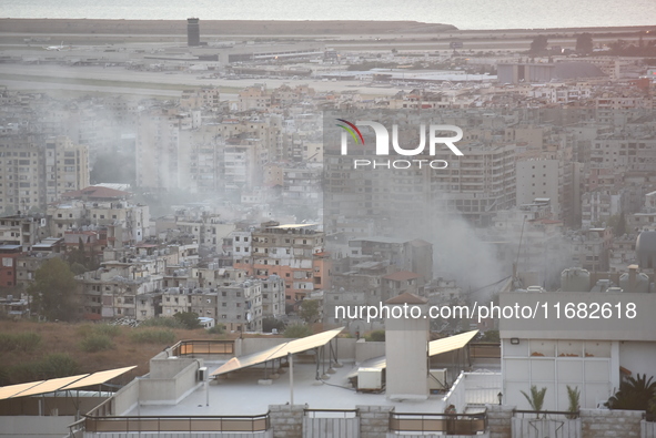 Black smoke billows from Beirut's southern suburb following heavy Israeli air raids on the pro-Iranian Hezbollah stronghold in Beirut, Leban...