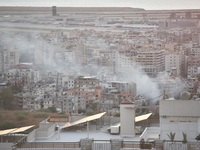 Black smoke billows from Beirut's southern suburb following heavy Israeli air raids on the pro-Iranian Hezbollah stronghold in Beirut, Leban...