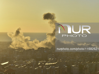 Black smoke billows from Beirut's southern suburb following heavy Israeli air raids on the pro-Iranian Hezbollah stronghold in Beirut, Leban...