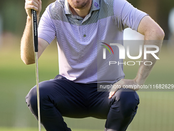 Andrew Wilson of England studies his shot on the 1st green on the third day of the Estrella Damm N.A. Andalucia Masters 2024 at Real Club de...