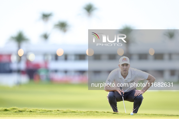 Matthias Schwab of Austria studies his shot on the 1st green on the third day of the Estrella Damm N.A. Andalucia Masters 2024 at Real Club...