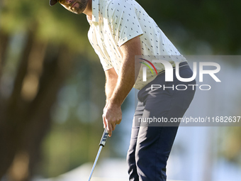 Adri Arnaus of Spain plays a shot on the 1st green on the third day of the Estrella Damm N.A. Andalucia Masters 2024 at Real Club de Golf So...