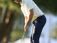 Adri Arnaus of Spain plays a shot on the 1st green on the third day of the Estrella Damm N.A. Andalucia Masters 2024 at Real Club de Golf So...