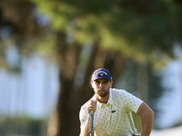 Adri Arnaus of Spain studies his shot on the 1st green on the third day of the Estrella Damm N.A. Andalucia Masters 2024 at Real Club de Gol...