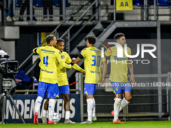 Players of RKC celebrate the goal of RKC forward Richonell Margaret, making the score 1-1, during the match between RKC and Twente at the Ma...