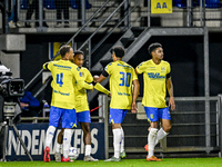 Players of RKC celebrate the goal of RKC forward Richonell Margaret, making the score 1-1, during the match between RKC and Twente at the Ma...