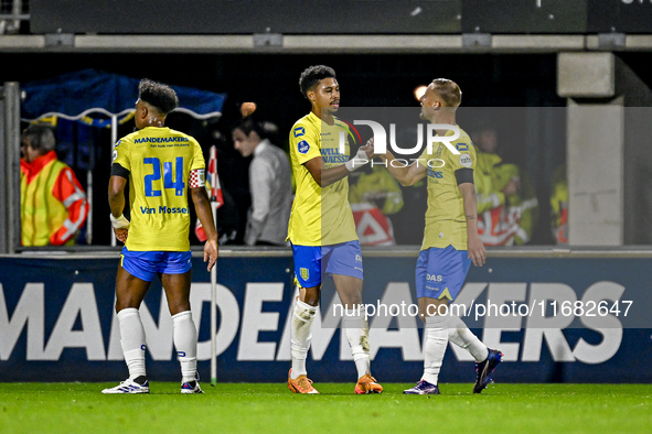 Players of RKC celebrate the goal of RKC forward Richonell Margaret, making the score 1-1, during the match between RKC and Twente at the Ma...