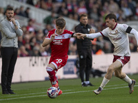 Ben Doak of Middlesbrough takes on Max Bird of Bristol City during the Sky Bet Championship match between Middlesbrough and Bristol City at...