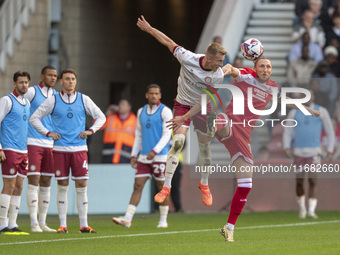 Luke Ayling of Middlesbrough challenges for the ball with Ross McCrorie of Bristol City during the Sky Bet Championship match between Middle...