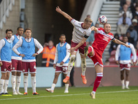 Luke Ayling of Middlesbrough challenges for the ball with Ross McCrorie of Bristol City during the Sky Bet Championship match between Middle...