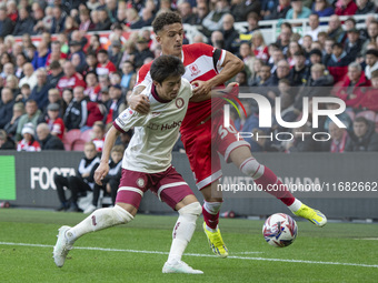 Middlesbrough's Neto Borges challenges for the ball with Bristol City's Yu Hirakawa during the Sky Bet Championship match between Middlesbro...