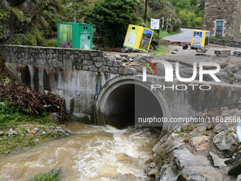 A collapsed road after flooding in the Rhone Valley in the village of Lupe, Loire department, on October 19, 2024. (