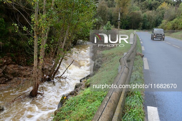 A collapsed road after flooding in the Rhone Valley in the village of Lupe, Loire department, on October 19, 2024. 