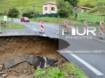 A collapsed road after flooding in the Rhone Valley in the village of Lupe, Loire department, on October 19, 2024. (