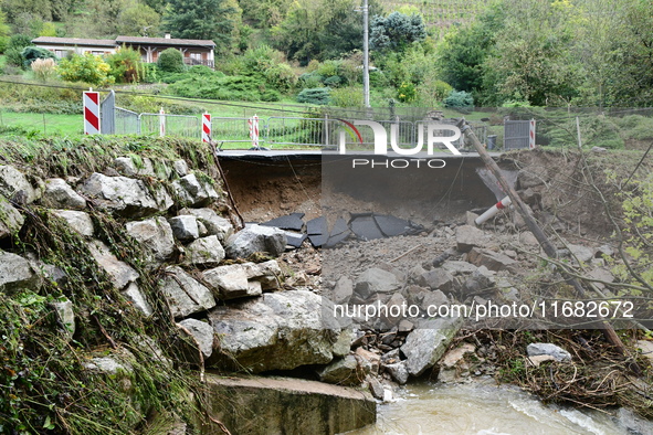 A collapsed road after flooding in the Rhone Valley in the village of Lupe, Loire department, on October 19, 2024. 