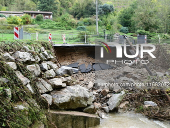 A collapsed road after flooding in the Rhone Valley in the village of Lupe, Loire department, on October 19, 2024. (