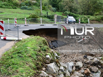 A collapsed road after flooding in the Rhone Valley in the village of Lupe, Loire department, on October 19, 2024. (