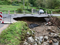 A collapsed road after flooding in the Rhone Valley in the village of Lupe, Loire department, on October 19, 2024. (