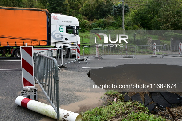 A collapsed road after flooding in the Rhone Valley in the village of Lupe, Loire department, on October 19, 2024. 