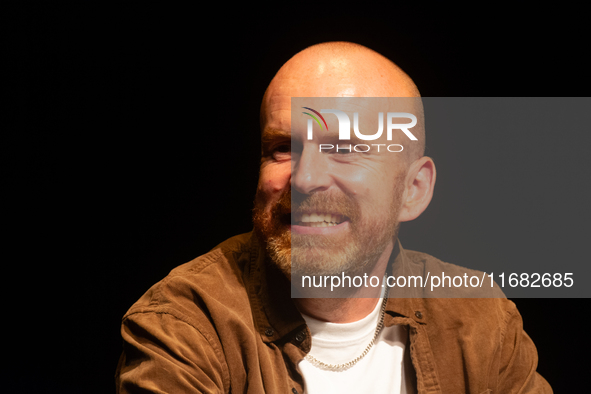 Matt Haig, the English author, appears on the stage of Schauspiel Koeln depot in Cologne, Germany, on October 19, 2024, during the Cologne l...