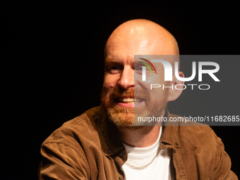 Matt Haig, the English author, appears on the stage of Schauspiel Koeln depot in Cologne, Germany, on October 19, 2024, during the Cologne l...