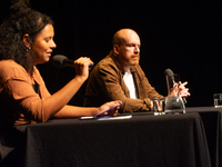 Matt Haig, the English author, and Alice Hasters, a German journalist, are seen on the stage of Schauspiel Koeln depot in Cologne, Germany,...