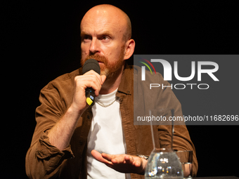 Matt Haig, the English author, appears on the stage of Schauspiel Koeln depot in Cologne, Germany, on October 19, 2024, during the Cologne l...