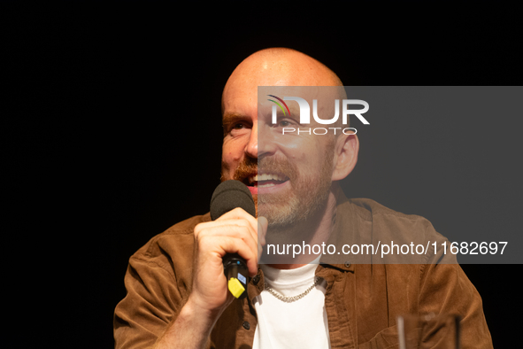 Matt Haig, the English author, appears on the stage of Schauspiel Koeln depot in Cologne, Germany, on October 19, 2024, during the Cologne l...