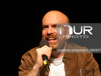 Matt Haig, the English author, appears on the stage of Schauspiel Koeln depot in Cologne, Germany, on October 19, 2024, during the Cologne l...