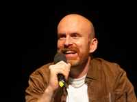 Matt Haig, the English author, appears on the stage of Schauspiel Koeln depot in Cologne, Germany, on October 19, 2024, during the Cologne l...