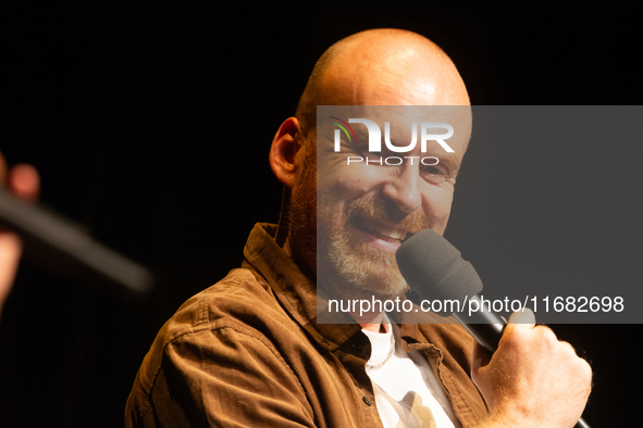 Matt Haig, the English author, appears on the stage of Schauspiel Koeln depot in Cologne, Germany, on October 19, 2024, during the Cologne l...