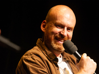 Matt Haig, the English author, appears on the stage of Schauspiel Koeln depot in Cologne, Germany, on October 19, 2024, during the Cologne l...