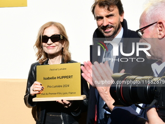 Rachida Dati, Minister of Culture, and Isabelle Huppert attend the remake of the light factories in Lyon, France, on October 19, 2024. (