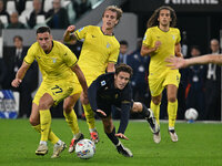 Adam Marusic and Nicolo Rovella of S.S. Lazio and Kenan Yildiz of Juventus F.C. are in action during the 8th day of the Serie A Championship...