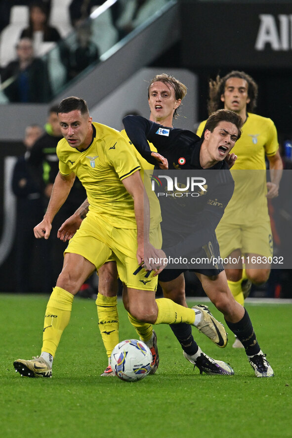 Adam Marusic and Nicolo Rovella of S.S. Lazio and Kenan Yildiz of Juventus F.C. are in action during the 8th day of the Serie A Championship...