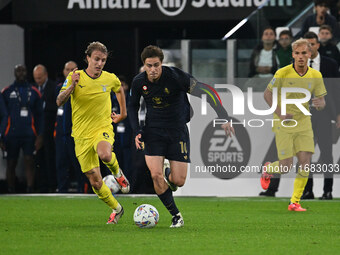 Nicolo Rovella of S.S. Lazio and Kenan Yildiz of Juventus F.C. are in action during the 8th day of the Serie A Championship between Juventus...