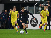 Nicolo Rovella of S.S. Lazio and Kenan Yildiz of Juventus F.C. are in action during the 8th day of the Serie A Championship between Juventus...