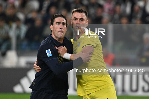 Dusan Vlahovic of Juventus F.C. and Patric of S.S. Lazio participate in the 8th day of the Serie A Championship between Juventus F.C. and S....