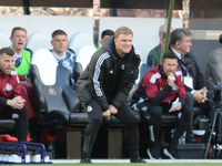 Newcastle United Manager Eddie Howe strains during the Premier League match between Newcastle United and Brighton and Hove Albion at St. Jam...