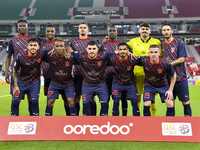 Al Duhail SC team players pose for a team photo before the Ooredoo Qatar Stars League 24/25 match between Al Ahli SC and Al Duhail SC at Al...