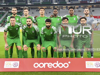 Al Ahli SC team players pose for a team photo before the Ooredoo Qatar Stars League 24/25 match between Al Ahli SC and Al Duhail SC at Al Th...