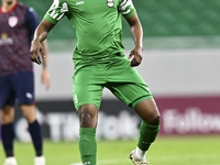 Idrissa Doumbin of Al Ahli SC plays in the Ooredoo Qatar Stars League 24/25 match between Al Ahli SC and Al Duhail SC at Al Thumama Stadium...