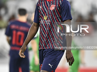 Michael Olunga of Al Duhail FC plays in the Ooredoo Qatar Stars League 24/25 match between Al Ahli SC and Al Duhail SC at Al Thumama Stadium...