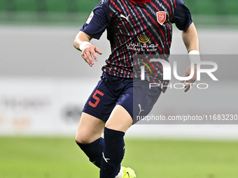 Bassam Hisham of Al Duhail FC plays in the Ooredoo Qatar Stars League 24/25 match between Al Ahli SC and Al Duhail SC at Al Thumama Stadium...