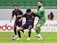 Edmilson Junior Paulo of Al Duhail FC battles for the ball with Driss Fettouhi of Al Ahli SC during the Ooredoo Qatar Stars League 24/25 mat...